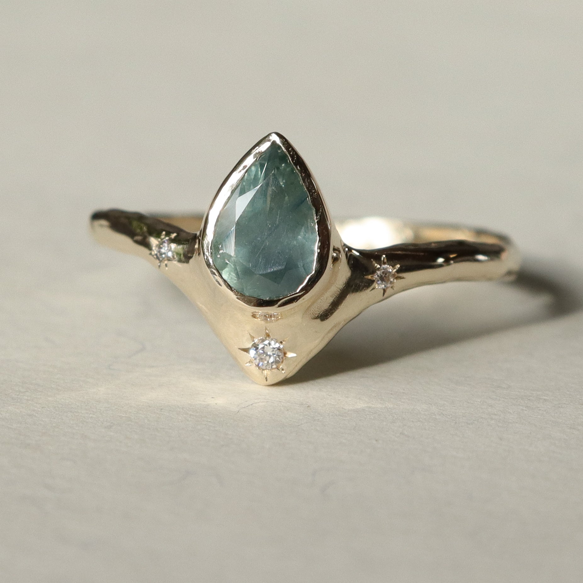 Custom Montana Sapphire Reign of Light Engagement Ring