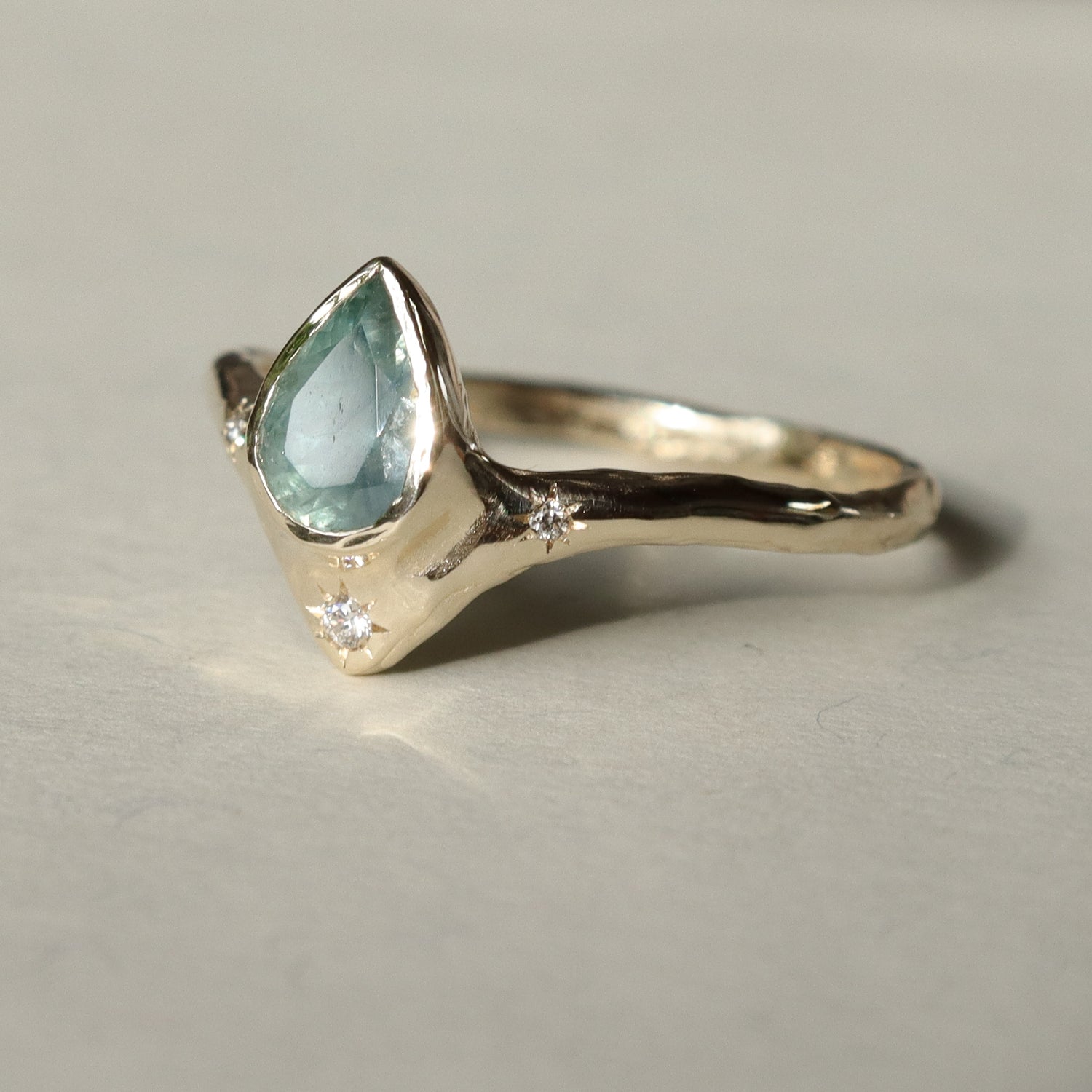 Custom Montana Sapphire Reign of Light Engagement Ring