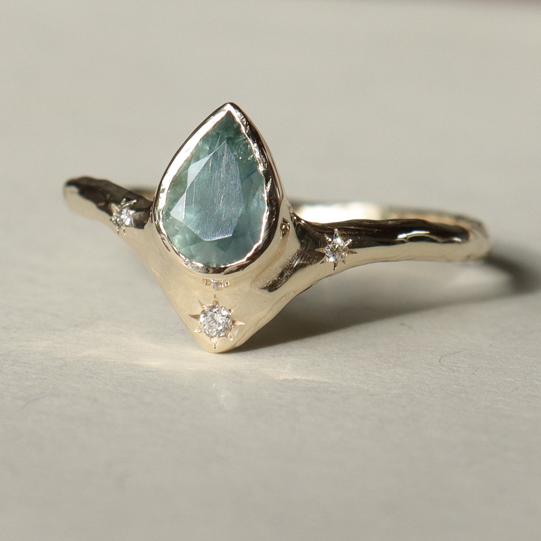 Custom Montana Sapphire Reign of Light Engagement Ring