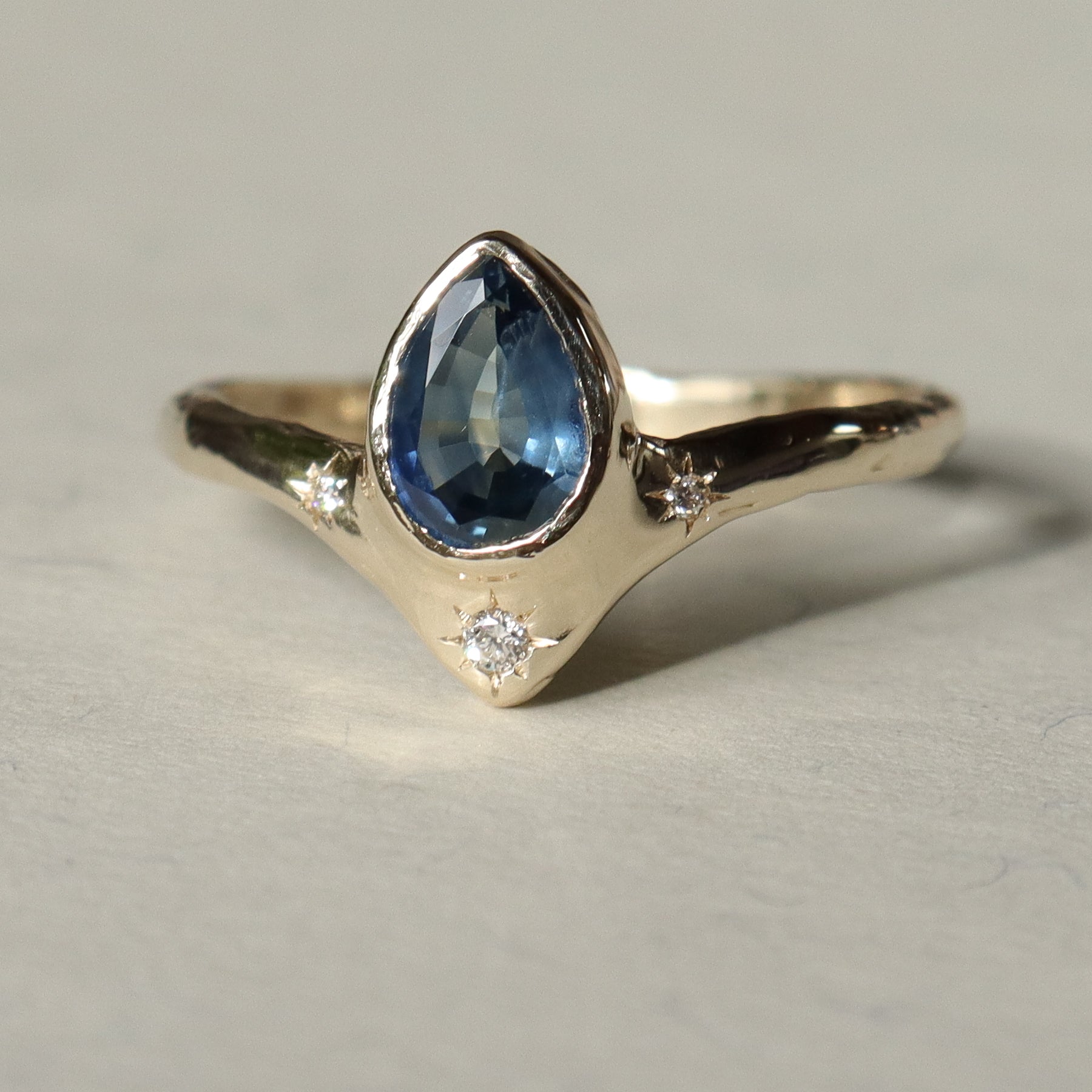 Custom Montana Sapphire Reign of Light Engagement Ring