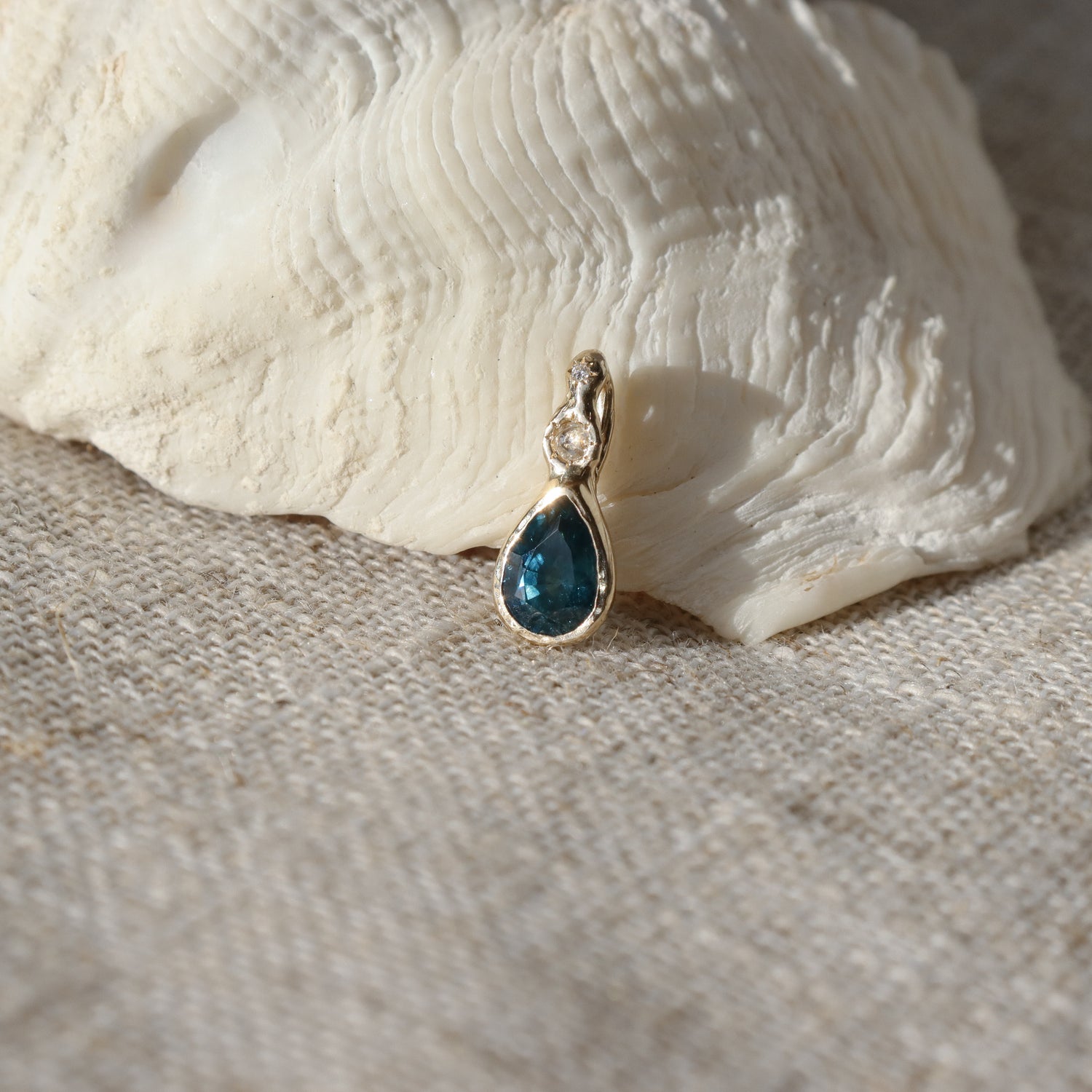 Daughter of the Tide | Droplet Charm, Dark Blue Montana Sapphire, Diamonds, 14k Gold