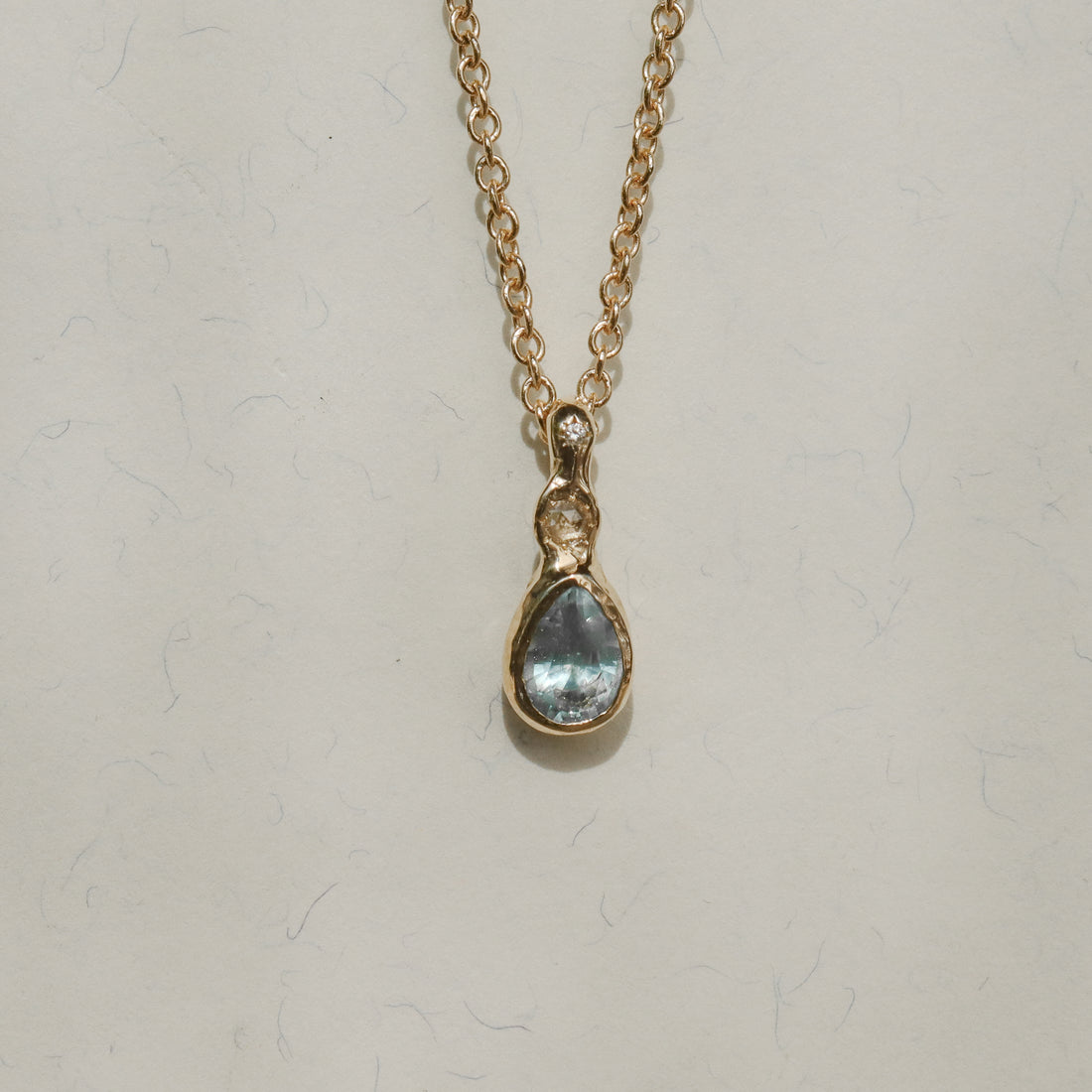 Daughter of the Tide | Droplet Charm, Sky Blue Montana Sapphire, Diamonds, 14k Gold