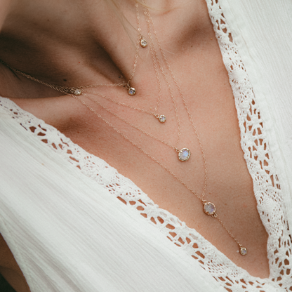 layered gold and moonstone necklaces