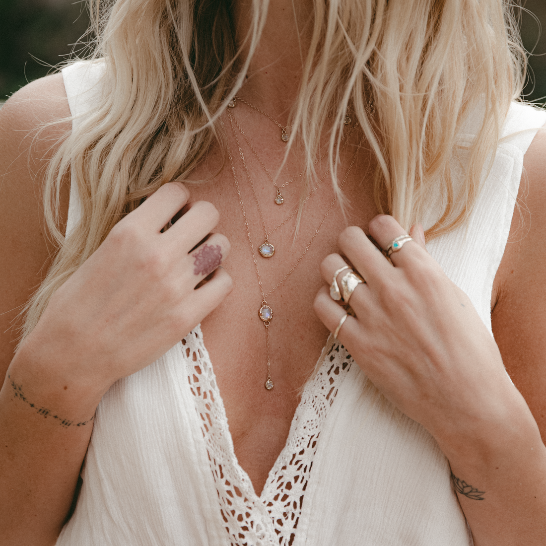 layered gold and moonstone necklaces