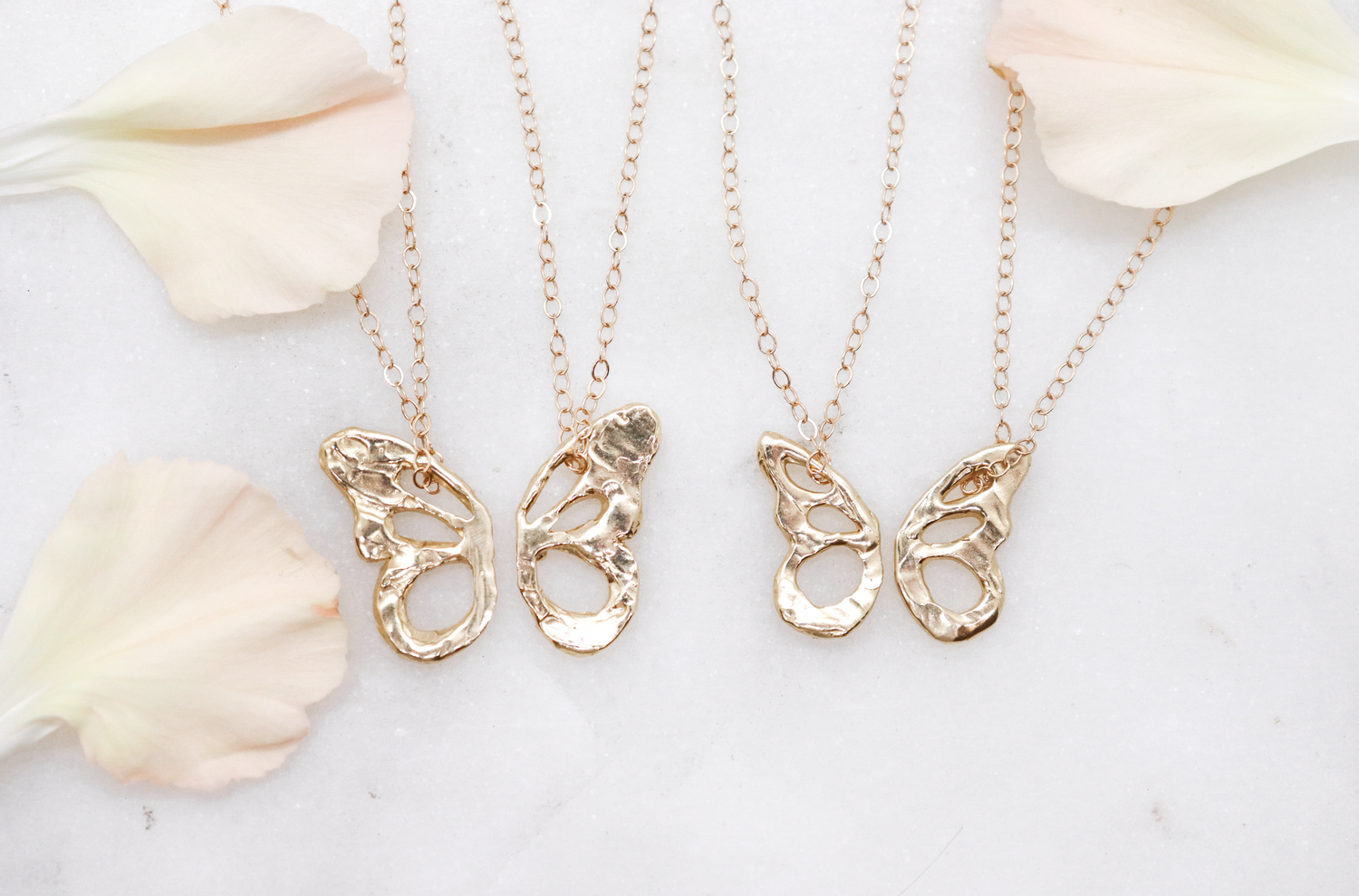 Best Friend butterfly charm necklaces made of 14k yellow gold
