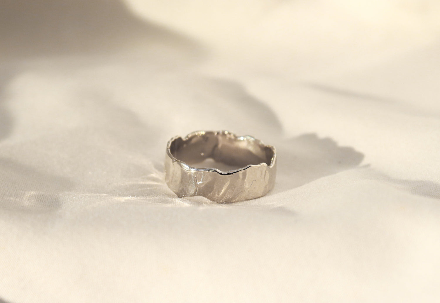 mens wedding band in 14k white gold with an organic texture