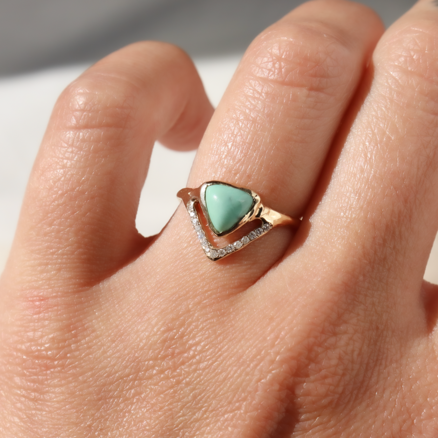 trillion variscite ring is worn on a ring finger to show size