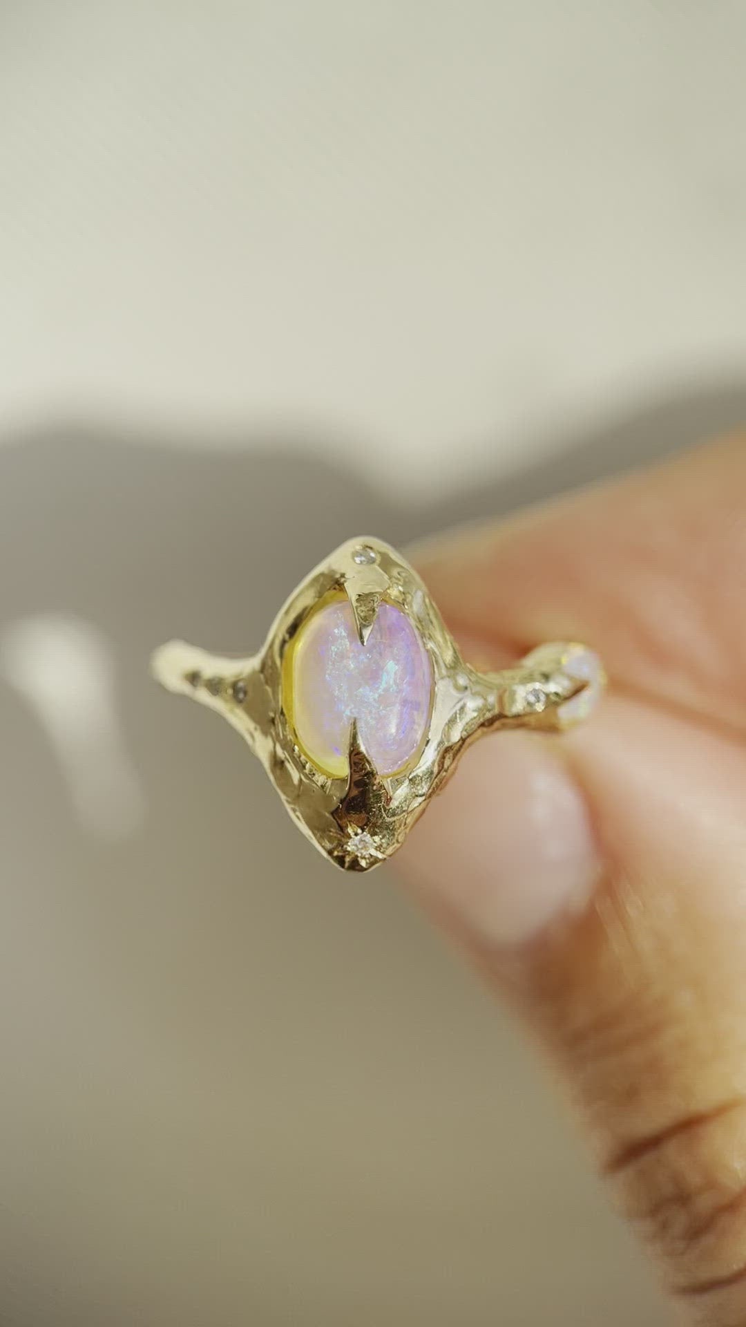 close up video of a pipe opal ring to show the colors of the opal
